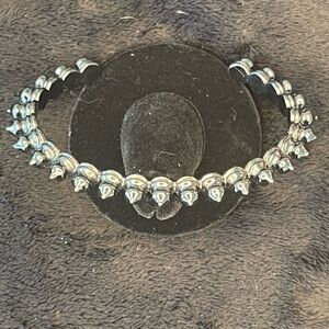 Kendra Scott gunmetal spiked cuff bracelet.